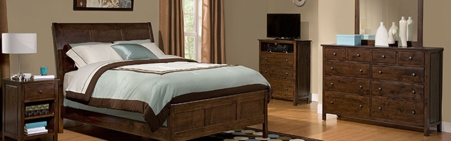 Real wood bedroom sets. A bedroom set in a beautiful room.